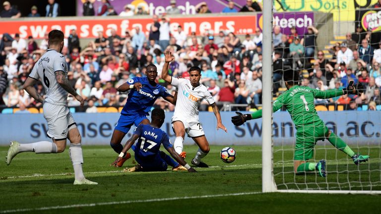 Kyle Naughton (2nd r) scored an own goal to put Everton in the lead