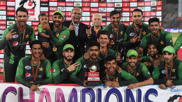 Pakistan's squad celebrate their 3-0 T20 series win over the West Indies