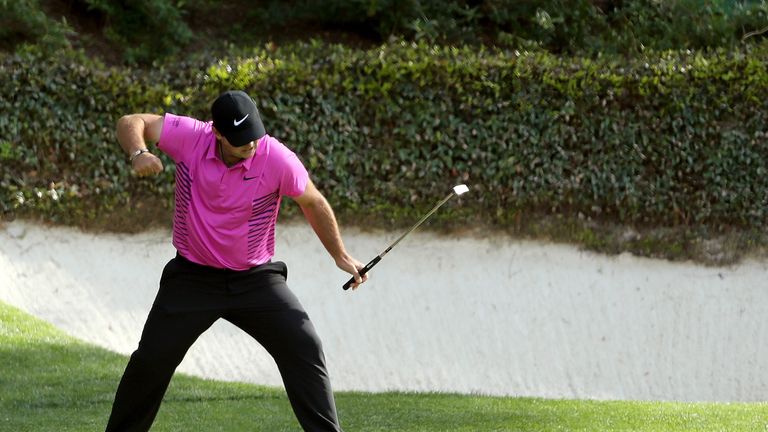 Reed celebrates his birdie on the 12th