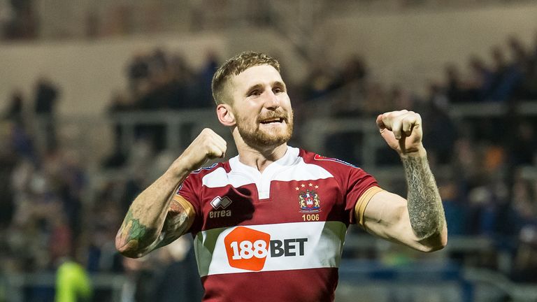 Wigan's Sam Tomkins celebrates the victory over Leeds