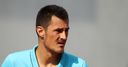 Tomic sets up Kyrgios clash