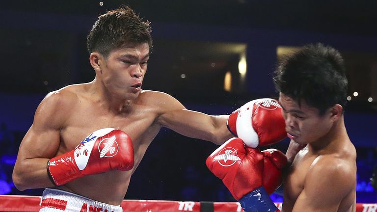 Jerwin Ancajas (l) was always in control (Mikey Williams)
