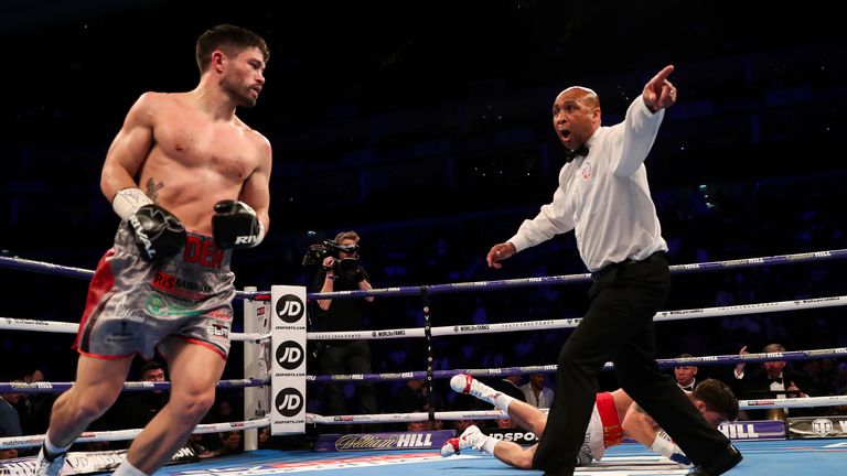 John Ryder wheels away after flooring Jamie Cox