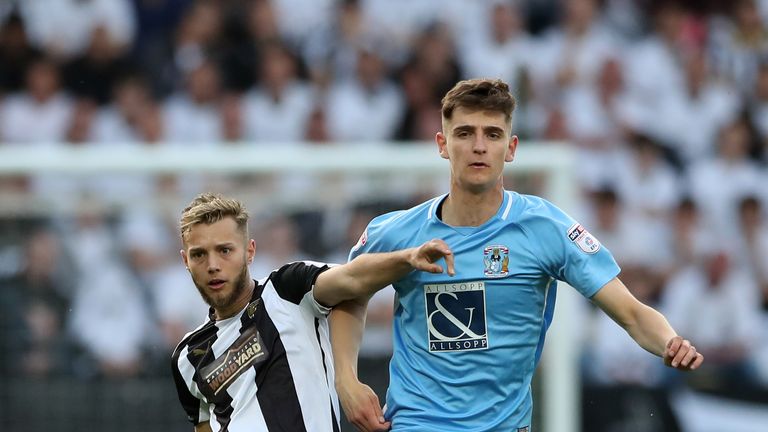 Notts County's Jorge Grant and Coventry's Tom Bayliss (right) battle for the ball