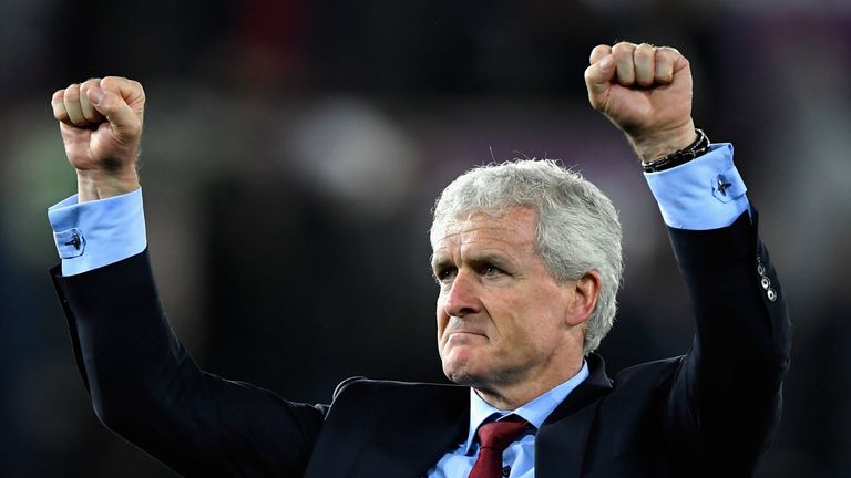 Mark Hughes celebrates after Southampton beat Swansea 1-0