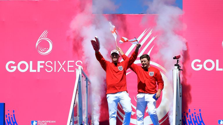 Matt Wallace and Eddie Pepperell of England are introduced to the crowd at the GolfSixes