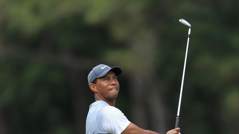 Tiger Woods hit an iron off the tee on 18 and still needed only a nine-iron for his second
