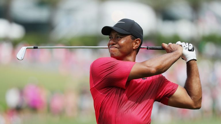 Woods was six under for the day after 12 holes
