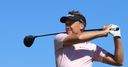 Positive Poulter shares lead