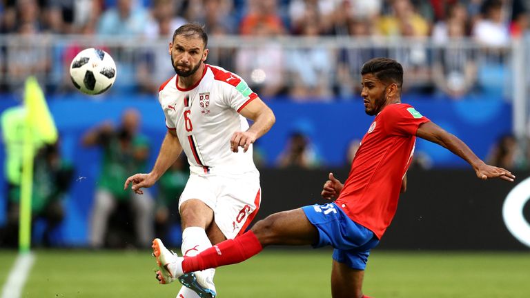 Branislav Ivanovic (left) and Johan Venegas challenge for the ball at Samara Arena