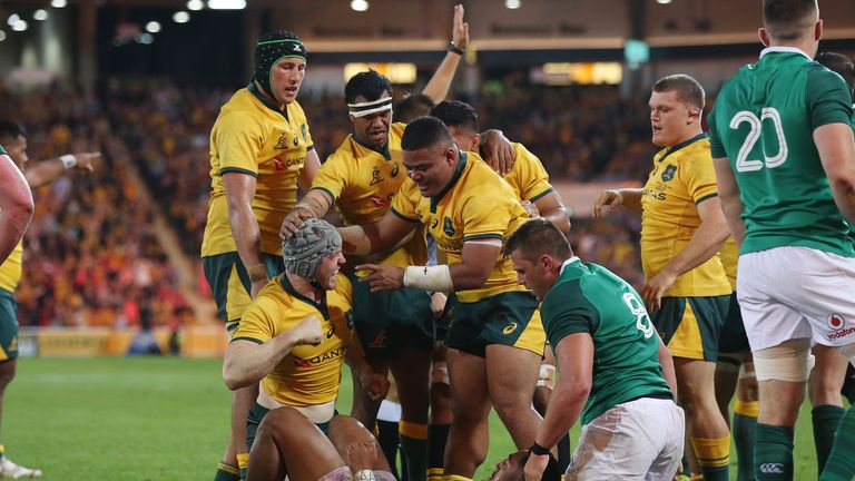 David Pocock celebrates after scoring for Australia