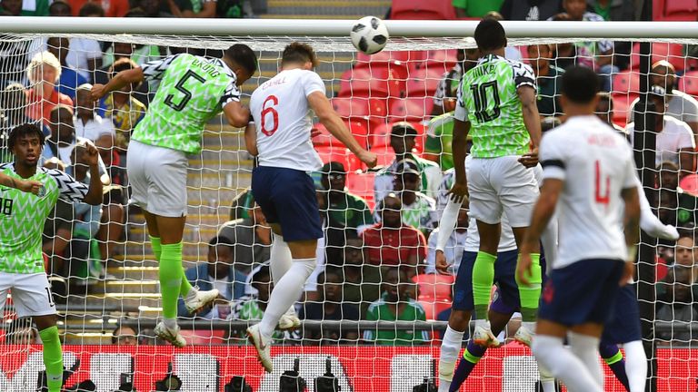 Gary Cahill (centre) scores England's opening goal against Nigeria