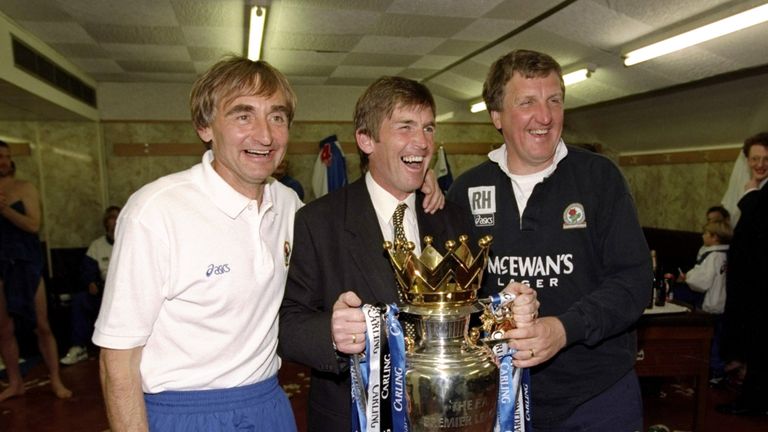 Dalglish (centre) celebrates winning the Premier League