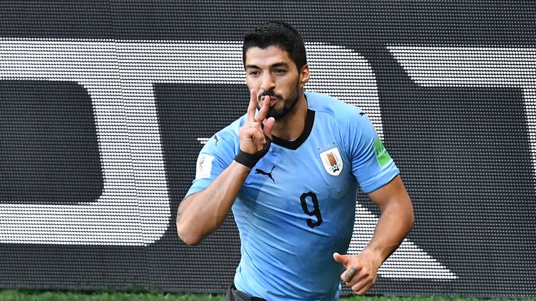 Luis Suarez celebrates after putting Uruguay ahead