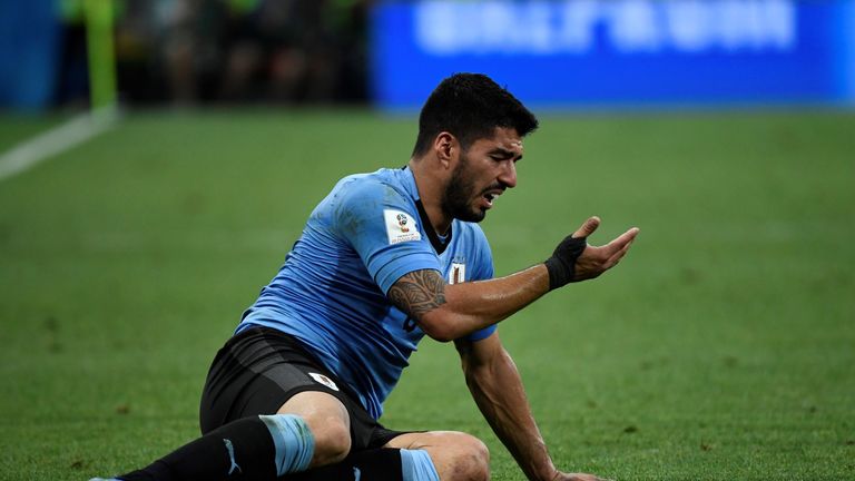 Luis Suarez back to his tenacious best as Uruguay beat Portugal