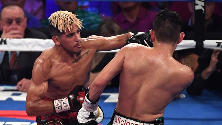 Dogboe produced a stellar performance to rip the title from Magdaleno (L)