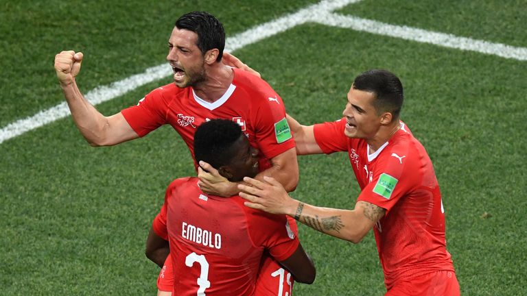 Blerim Dzemaili (L) celebrates after scoring against Costa Rica