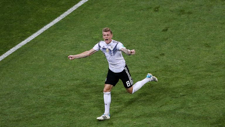 Toni Kroos celebrates his stunning last-minute winner against Sweden