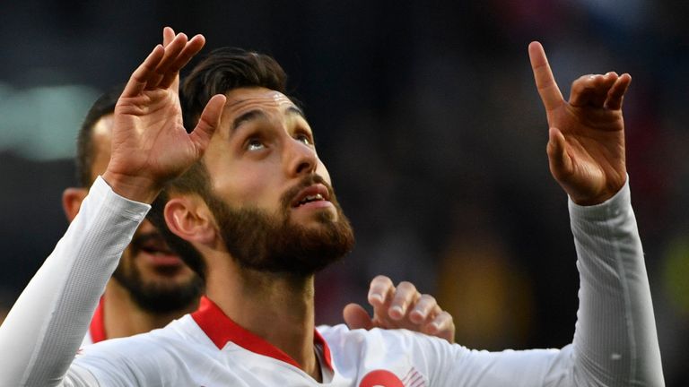 Turkey's Yunus Malli celebrates after scoring against Russia
