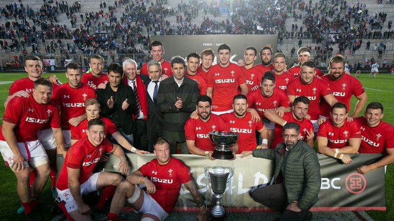 The Wales team celebrate their 23-10 victory over Argentina