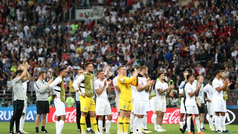 The England team applaud their fans after semi-final disappointment