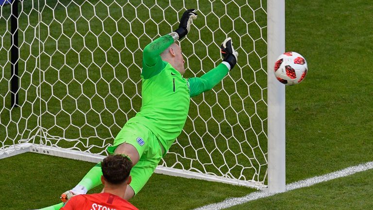 Jordan Pickford tips away Marcus Berg's header