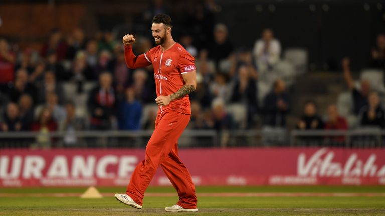   Jordan Clark celebrates a wicket in the running of Yorkshire 