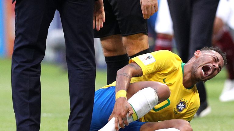 Neymar screams in pain after going down injured on the touchline