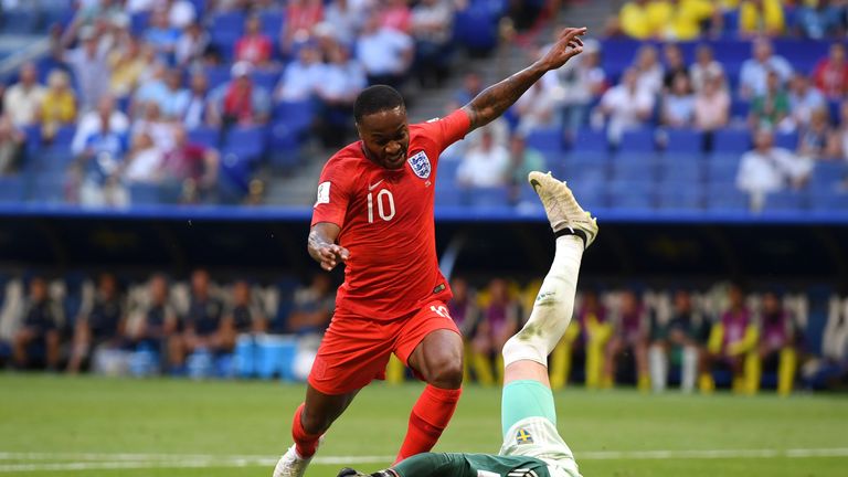 Robin Olsen denies Raheem Sterling in the first half