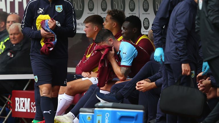Robbie Brady of Burnley looks dejected after coming off in the first half