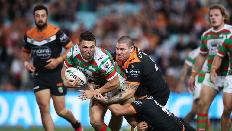 Sam Burgess is tackled during the Rabbitohs' loss to Wests Tigers