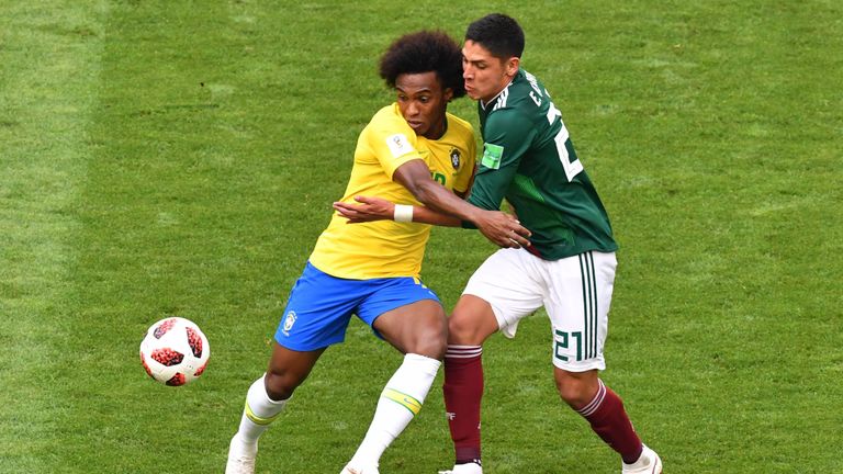 Willian (left) was man of the match in Samara