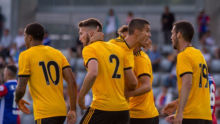 Wolves' players celebrate their win over Basel