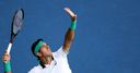Del Potro wins amid rain delays