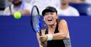 Sharapova battles to win at US Open