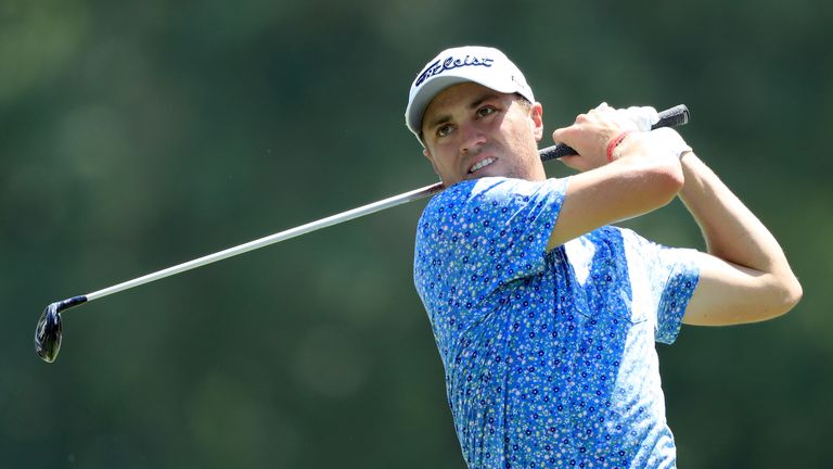 Thomas has a three-shot lead over McIlroy and Poulter
