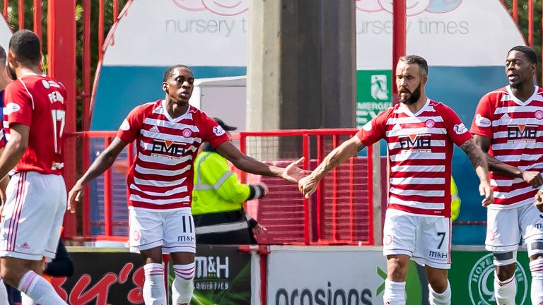 Hamilton's Mikael Miller (left) celebrates after making it 1-0 against Hearts on Scottish Premiership opening weekend.