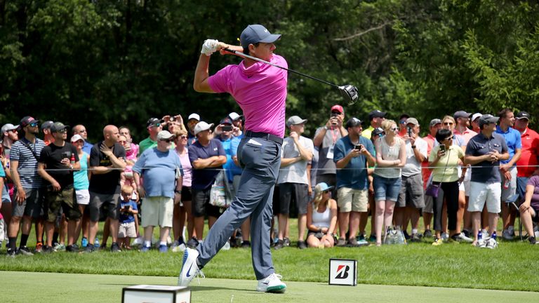 McIlroy's birdie-birdie finish lifted him to within three of the lead