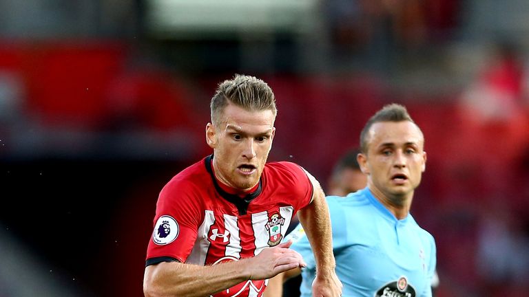 Steven Davis and Stanislav Lobotka battle for the ball during Southampton v Celta Vigo
