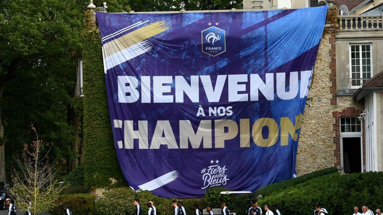 A large banner congratulating France on their World Cup win greeted the players at Clairefontaine