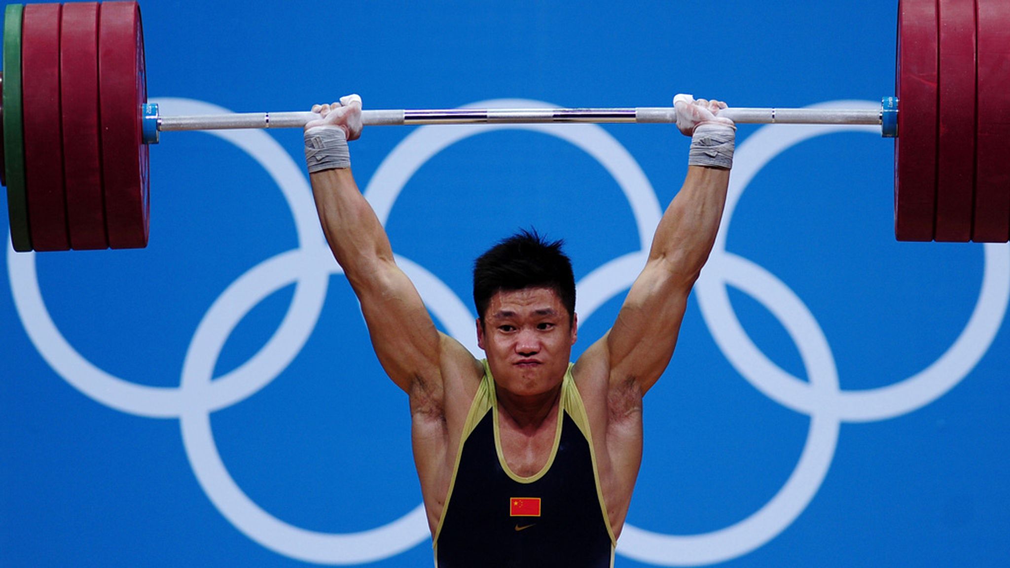 At 37, Lyu Xiaojun becomes oldest Olympic weightlifting champion