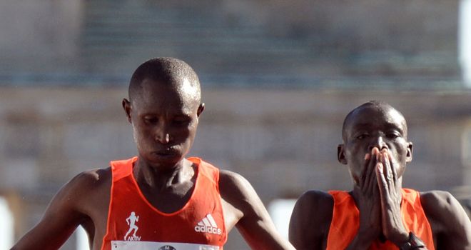 Geoffrey Mutai: Berlin winner (left) survived a brave challenge from Dennis Kimetto