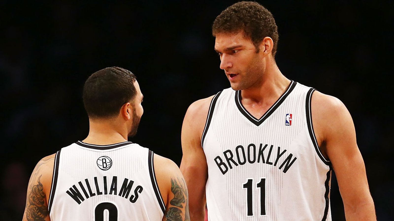 The Brooklyn Nets held on for a 107100 win in their first game at their new Barclays Center