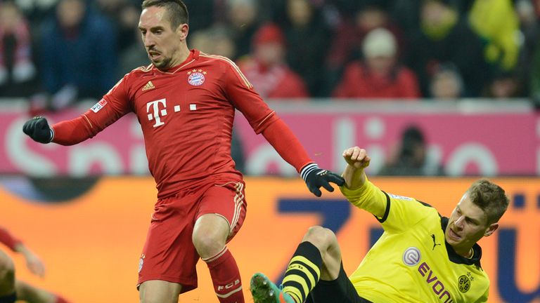 Franck Ribery is challenged by Lukas Piszczek