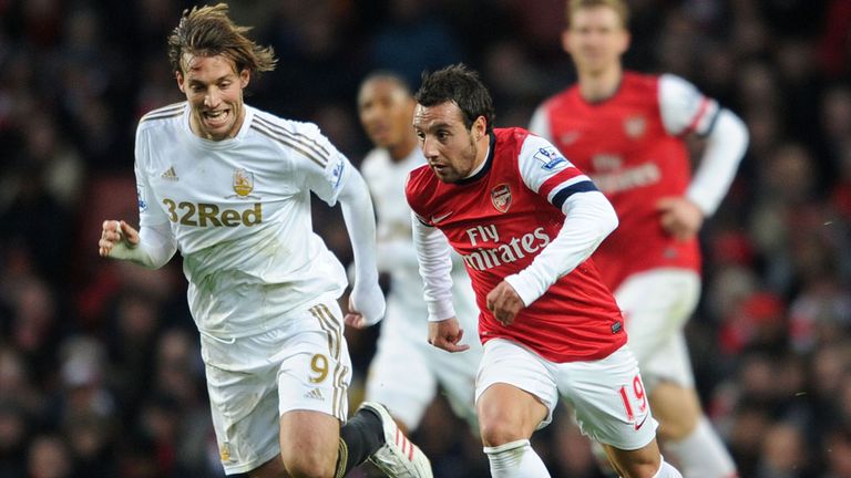 Michu (l): Tracks Arsenal's Cazorla