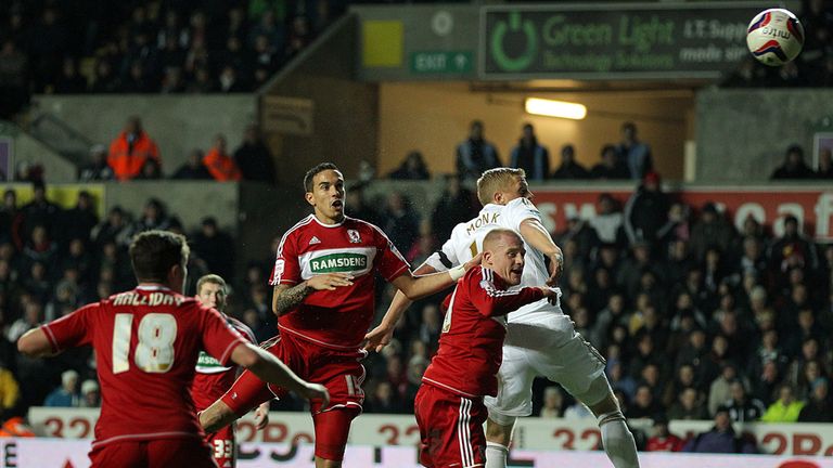 Own goal: Seb Hines is consoled by Richie Smallwood after his own goal gave Swansea victory