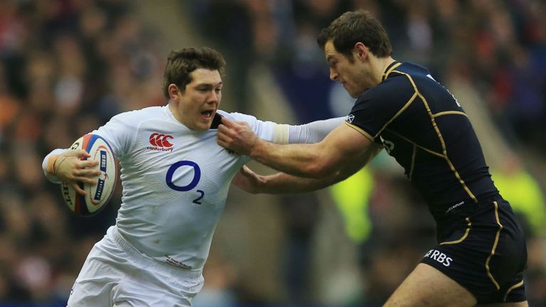 England&#39;s Alex Goode hands off Scotland wing Tim Visser