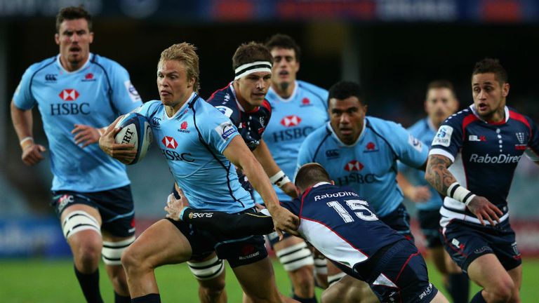 Tom Kingston on the attack for the Waratahs