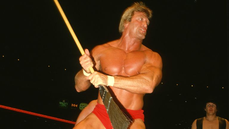 Paul Orndorff wields a broom at WrestleMania 1