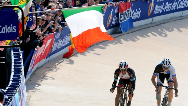 Fabian Cancellara and Sep Vanmarcke sprint for the win in the Roubaix Velodrome in the 2013 race